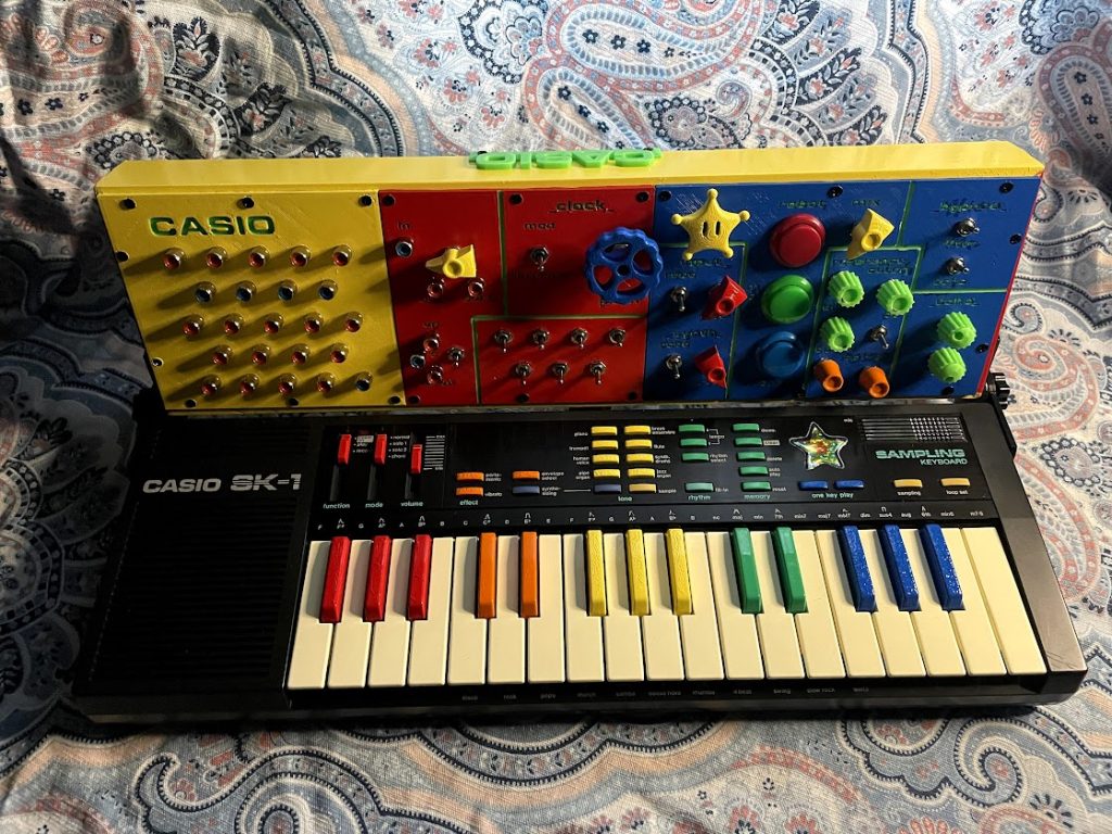 Full View of a Circuit Bent Casio SK-1 with Angled Panel